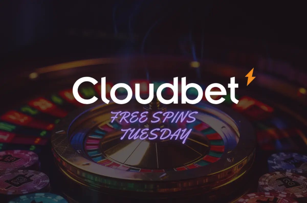 A close-up view of a roulette wheel with the title "Cloudbet Free Spins Tuesdays" prominently displayed, emphasizing the 20 free spins offered every Tuesday.